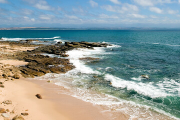 Beautiful beach in Mosselbay with blue sky in the background on the Famous Garden Road in South Africa