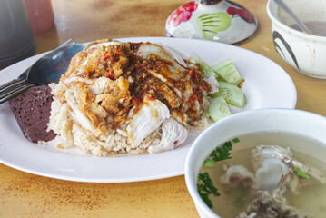 Chicken Rice and Soup, a popular food eaten in Thailand and sold in restaurants.