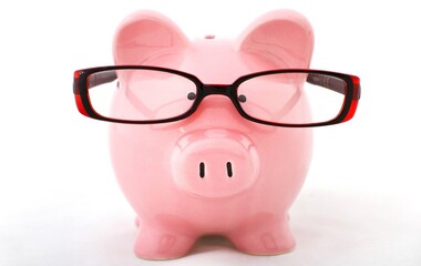 Piggy bank wearing glasses