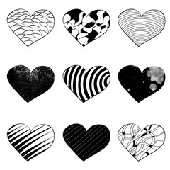 Hand drawn graphic hearts in black and white colors. Love symbol set for Valentine's day card. Hearts isolated on white background