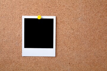 Blank photograph on a bulletin board
