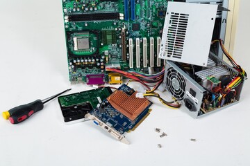 Screwdriver With Disassembled Computer Close-up