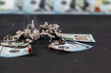 burning dollars close up