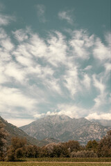 Fototapeta premium Dramatic clouds over the mountains in the Italian countryside