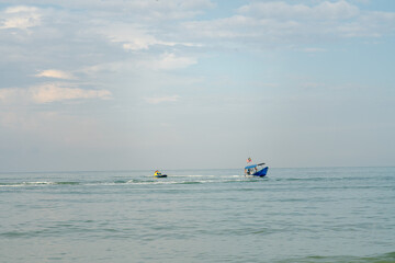 Naklejka premium People having fun on water craft at Port Dickson.