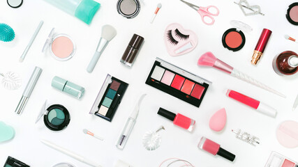 Tender pink monochrome feminine makeup tools and silver accessories. brushes eye lashes vanish on candy pink. Flat lay, birthday beauty cosmetics blogger advert border concept. Heart, love hair clips