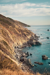 The mountains next to the ocean on a famous highway