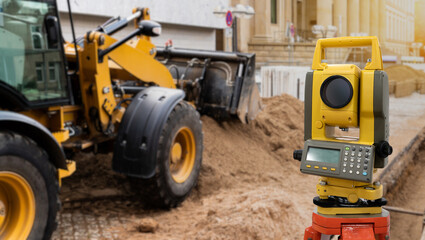 Theodolite (total positioning station) on a background of construction site