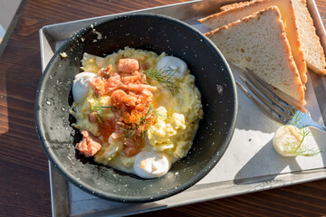 Scrambled eggs with salmon and chives