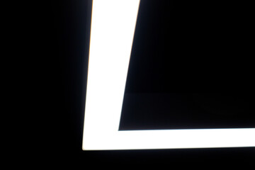 black and white asymmetrical striped background. white line light on black background