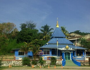 a traditional blue color mosque in Port Dickson town Malaysia
