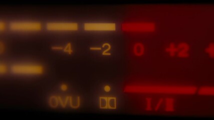 Close up of digital volume meter on deck tape recorder.