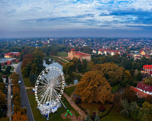 Amazing aerial photo about the Castle of Gyula ferris wheel. famous historical fort in south...