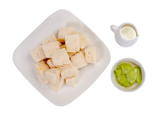 Steamed bread with Thai custard on white background.
