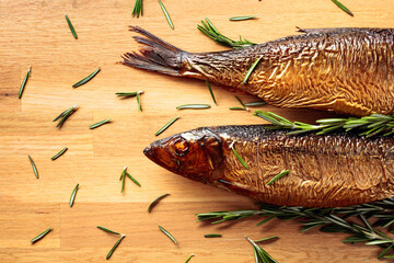 Smocked herring on a wooden table.