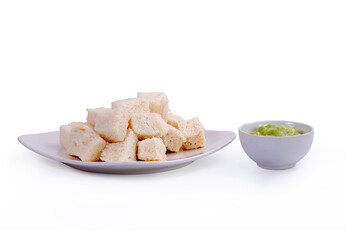Steamed bread with Thai custard on white background.