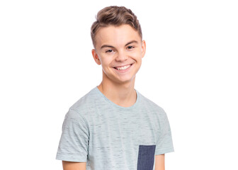 Handsome teen boy laughing looking very happy.