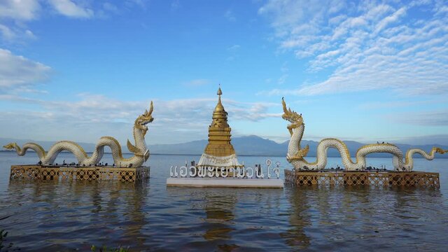 Serpent statue Phayao Province landmarks are popular to release birds and fish to make merit.