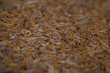 brown wicker mat and carpet background