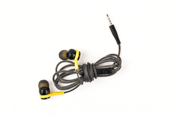 Top view of folded earphone isolated on white background wit clipping path