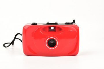 Old plastic film camera isolated on white background 