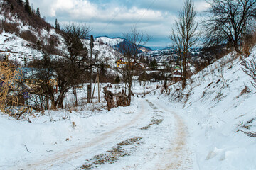 Fototapeta na wymiar Typical country side landscape in Slavske, Ukraine on January 1, 2020. 