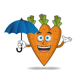 Carrot mascot character holding an umbrella. vector illustration