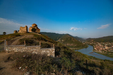 beautiful ancient monastery surrounded by mountains