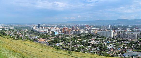 Panorama of Krasnoyarsk, Russia. View from the lookout point near the Paraskeva Pyatnitsa Chapel on the top of Karaulnaya Mountain.