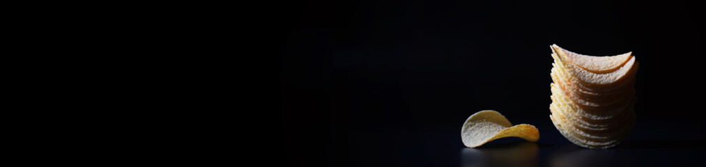 Potato and corn chips. Long banner. Space for text. Snacks and salty appetizer. Flavored Chips.