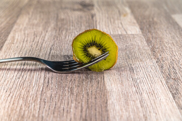 composition with kiwi and forks