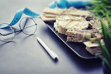 Tilt shift effect.Concept of losing weight and a healthy lifestyle. Bread roll with vegetables and...