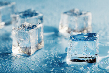 Blocks of Ice With water Drops close-up. Macro ice refreshing cube for a drink on a hot day