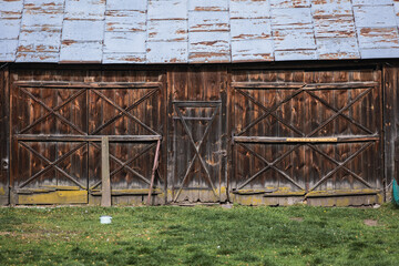 Old barn on a farmyard in rural area of Mazowsze region of Poland