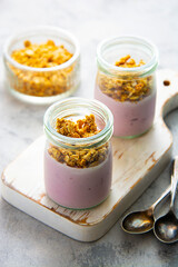 Healthy breakfast. Yogurt jars with granola. Copy space.