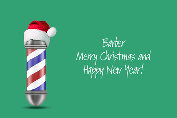 Barber Pole in Santa hat on a green background. Barber Merry Christmas and Happy New Year Concept. Beauty and fashion.