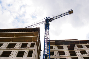 Construction site background. Crane near building. Industrial bacground.
