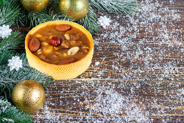 Cheesecake on a wooden background. New Year's composition. Christmas, winter, new year concept.