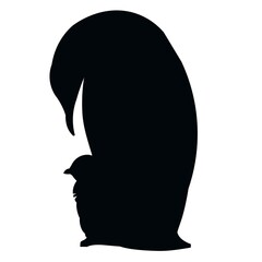 Emperor penguin bent over the baby penguin silhouette