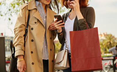 Women checking directions on smartphone