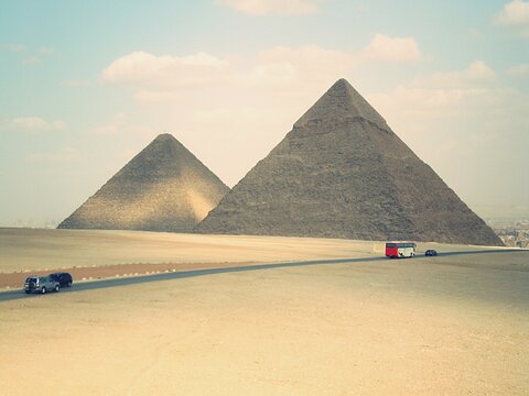 Road By Great Pyramid Of Giza Against Cloudy Sky