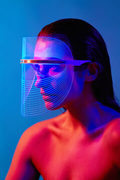 Woman using Led Mask - Blue & Red Antibacterial light