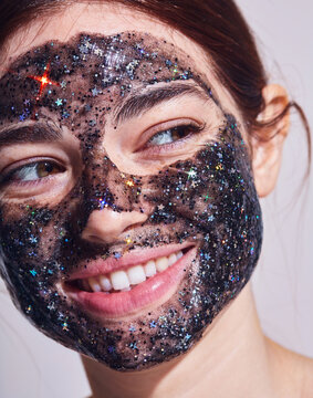 Beauty Skincare face mask Stars - Woman smiling portrait with facial treatment on