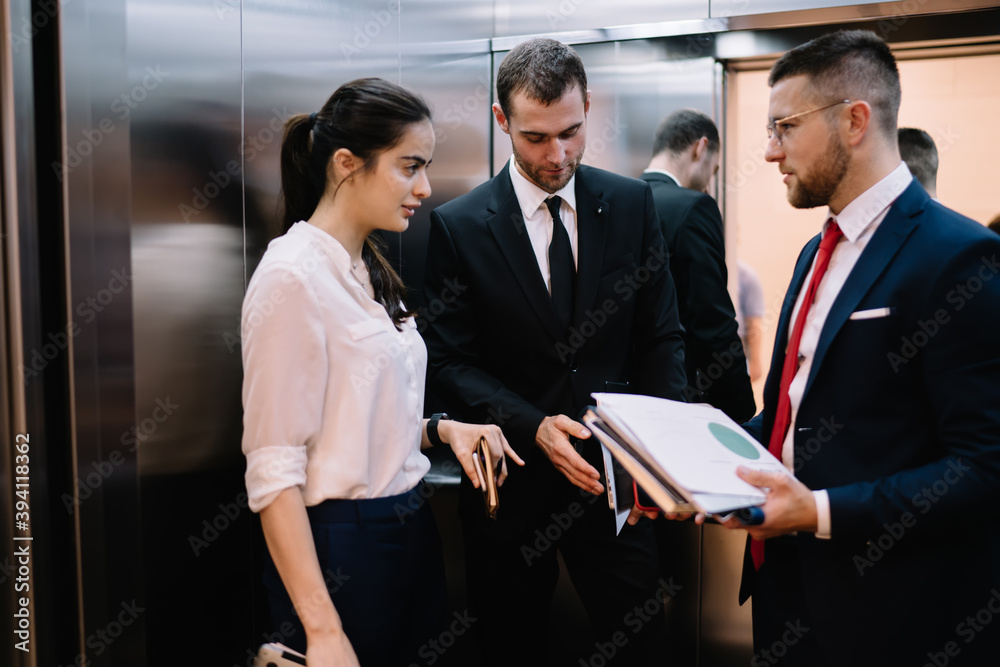 Wall mural group of business people discussing strategy