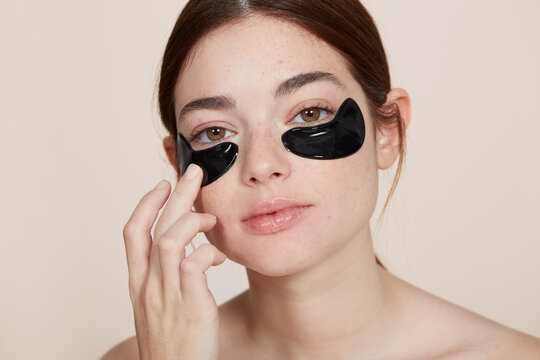 Cute Woman Using Under Eye Patch