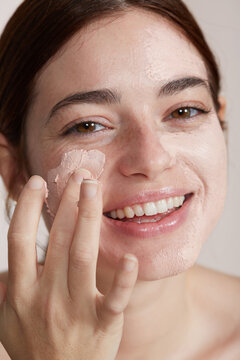 Woman Using Pink Clay Mask