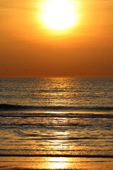 Fototapeta na wymiar Sunset at the beach of the North Sea 