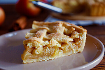 Traditional American Thanks Giving lattice pie isolated on white background. Homemade fruit tart baked to golden crust. Close up, copy space, top view.