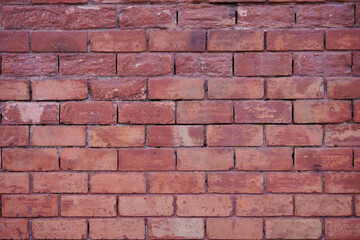 muro de ladrillos rojos antiguos en exteriores