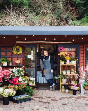 Flower shop owner in storefront